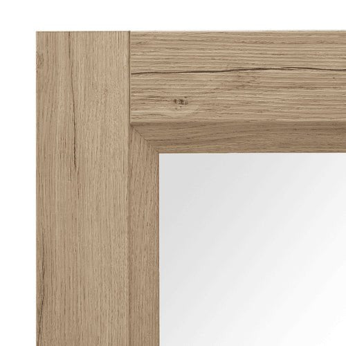 Détail du cadre en chêne naturel du miroir en bois, finition élégante et moderne