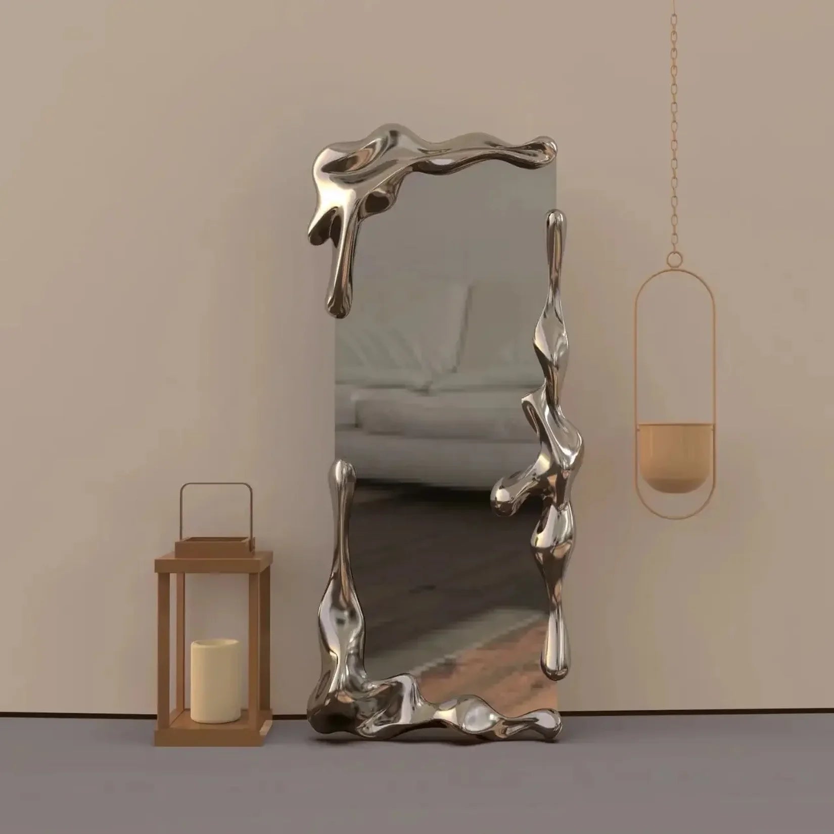 Miroir argenté Mercuria avec cadre chrome effet métal liquide.