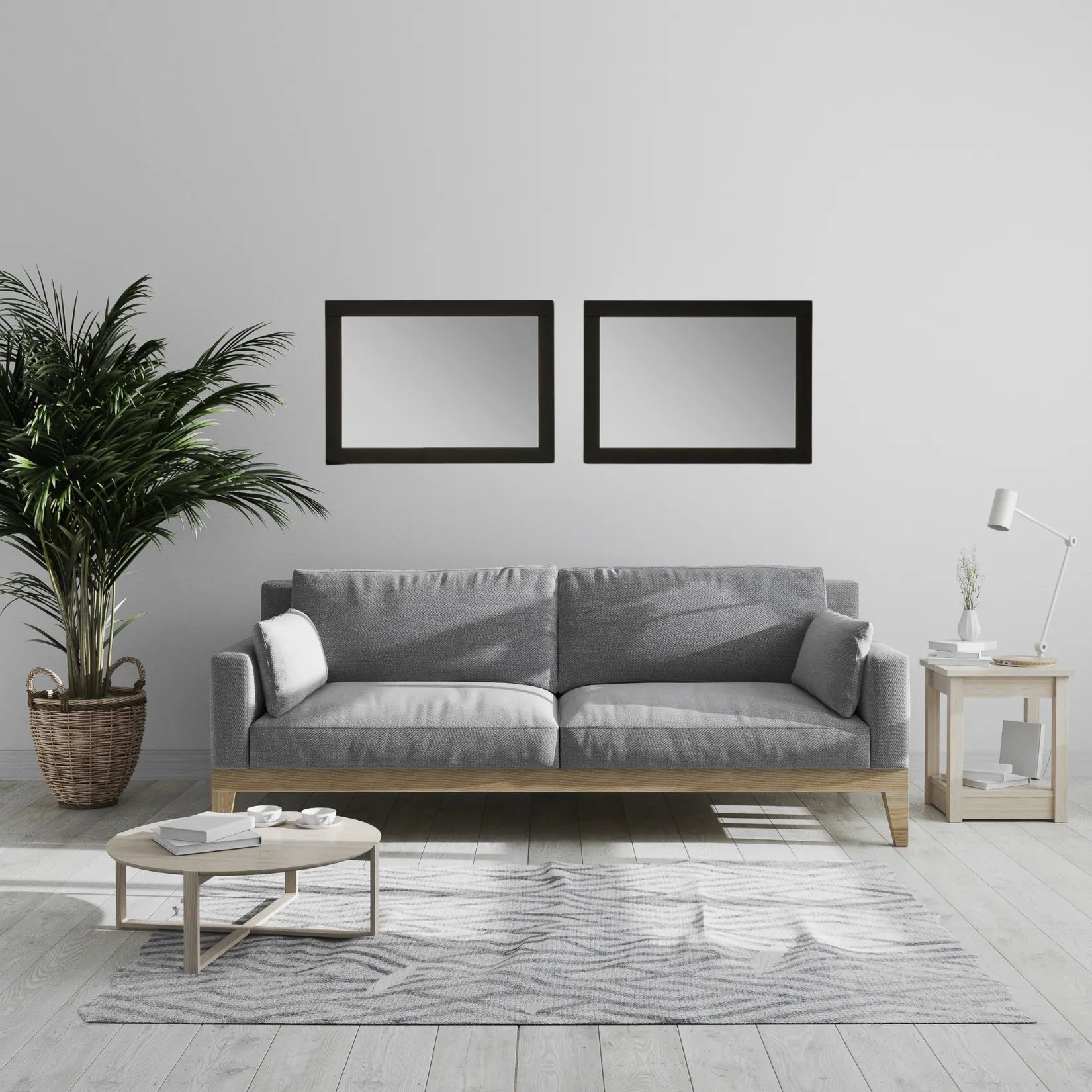 Miroirs minimalistes noirs dans un salon scandinave lumineux au mobilier clair.