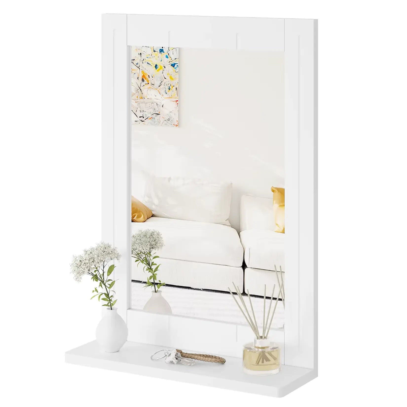 Miroir mural blanc décoré avec des accessoires.