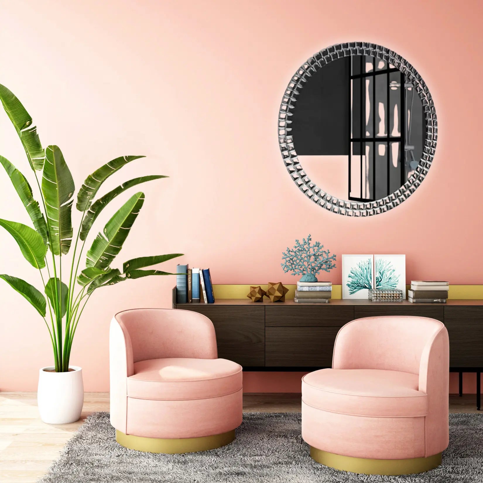 Miroir rond cristal dans une chambre élégante avec mur rose pâle.