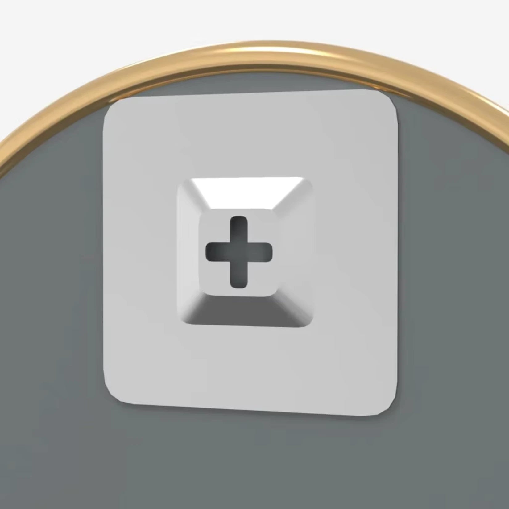 Gros plan sur le système de fixation murale discret du miroir rond doré.