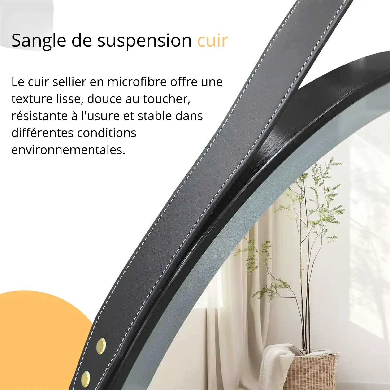 Détail sangle simili-cuir noir – miroir rond lumineux salle de bain.