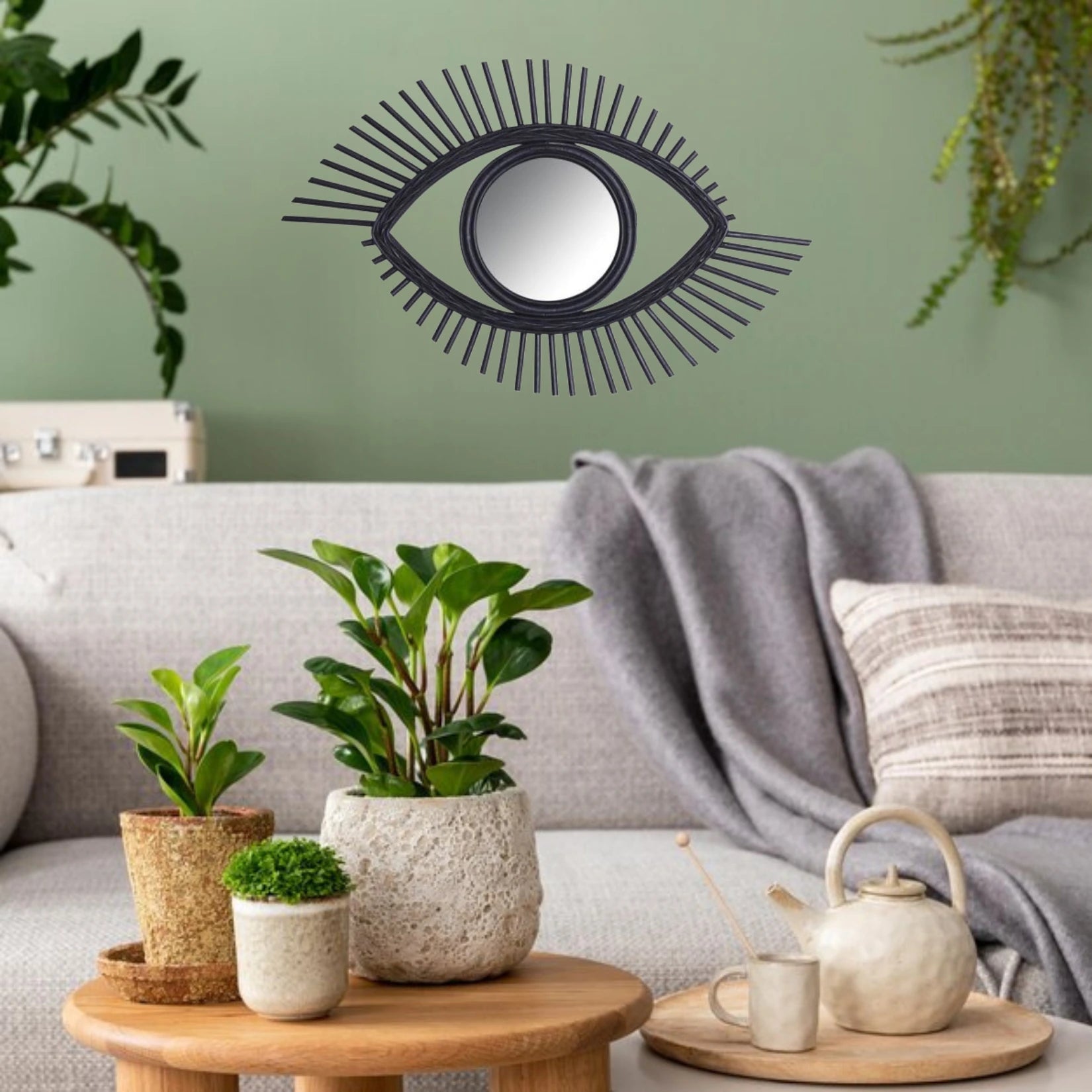 Miroir rotin noir au design original pour une décoration moderne et chic.