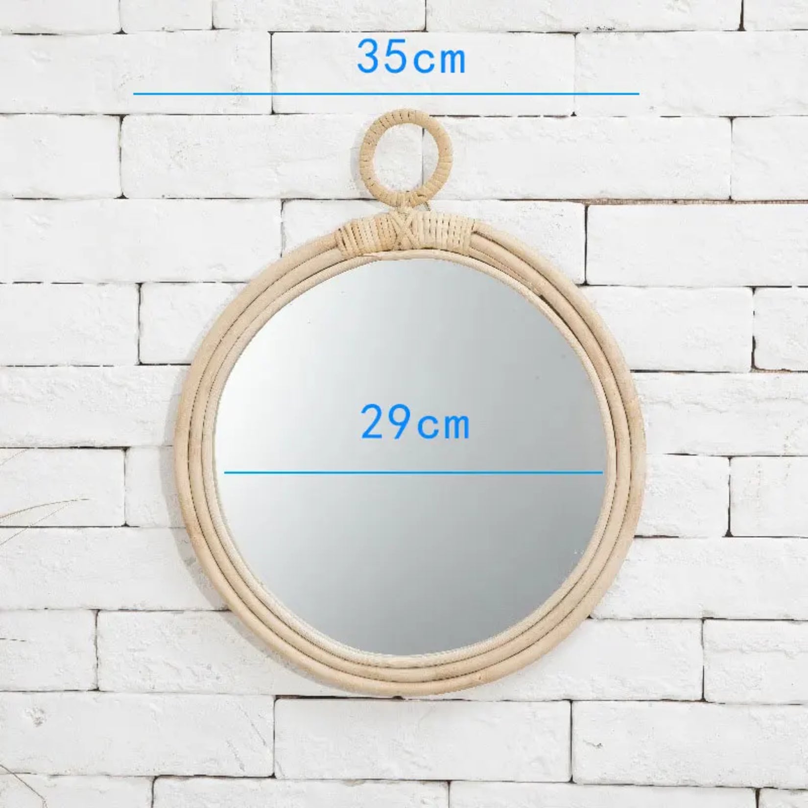 Miroir Rotin Rond avec anneau affichant ses dimensions de 35 cm de diamètre total et 29 cm de glace sur mur blanc.