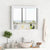 Armoire Miroir Salle de Bain 80 cm installée au-dessus du lavabo avec décoration moderne.
