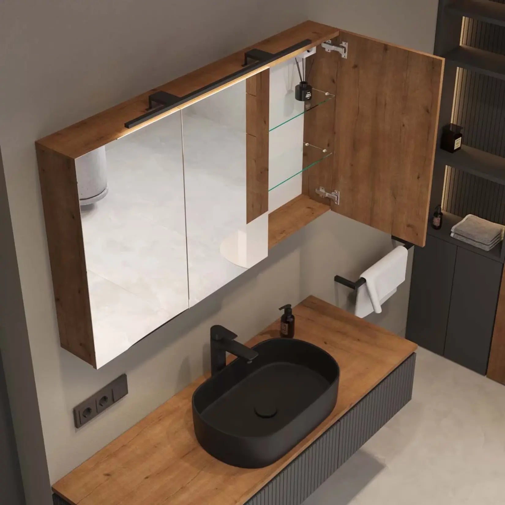 Vue du dessus de l’armoire salle de bain miroir 120 cm montrant la lumière LED et la structure en chêne doré.