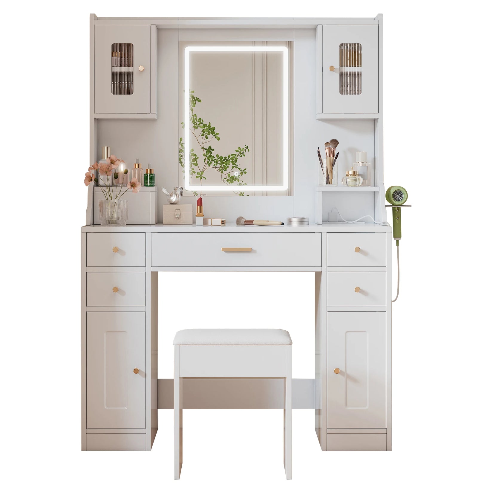 Coiffeuse avec miroir LED allumé et tabouret, ambiance lumineuse chaleureuse.