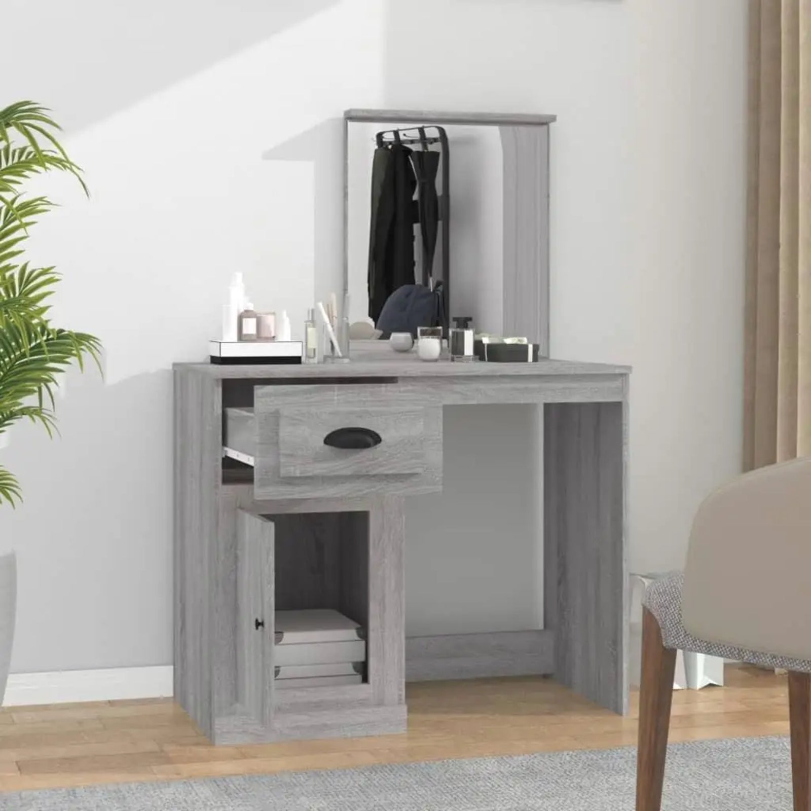 Coiffeuse miroir avec tiroir ouvert et armoire dans une chambre moderne