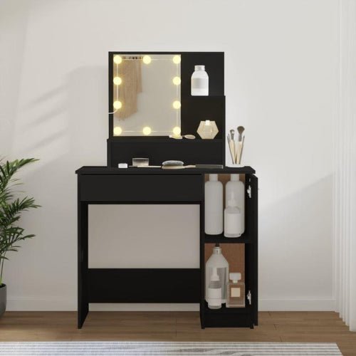 coiffeuse noire avec miroir LED allumé, créant un effet lumineux dans une pièce