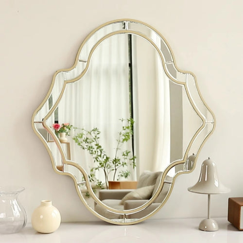 Miroir artistique au design unique avec cadre doré et argenté, idéal pour sublimer une décoration contemporaine