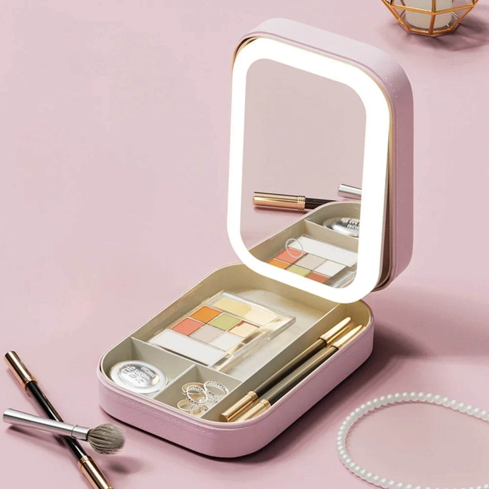 Miroir de sac LED vert avec rangement compartimenté et palette, format portable pour retouches.