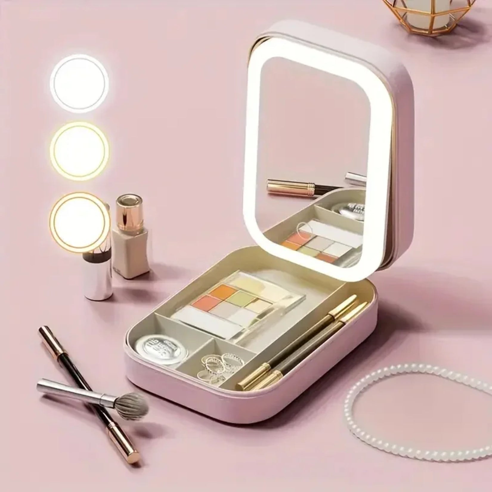 Miroir de sac LED rose ouvert avec illustration des 3 températures de lumière, accessoires de maquillage autour.