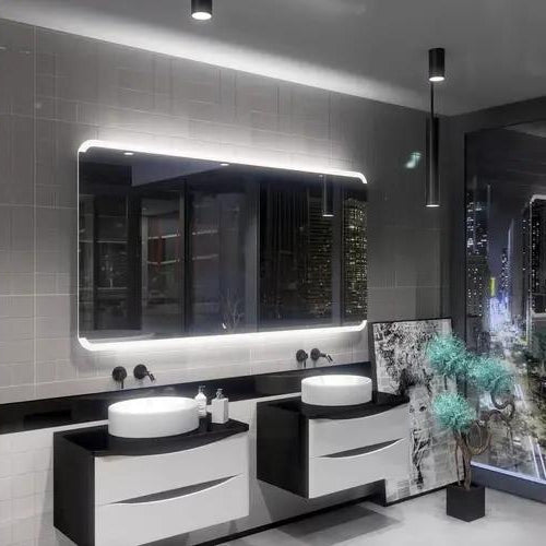 Miroir éclairé 180x80 avec halo lumineux au-dessus d'une double vasque, carrelage gris.