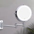 Miroir grossissant LED avec installation murale et bras articulé pratique.