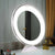 Miroir Grossissant et Lumineux 10X à Ventouse et sur Pied avec éclairage LED activé.