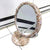 Miroir de maquillage en strass dorés scintillants pour un style glamour et raffiné.