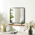 Miroir Mural Bois et Métal dans une Ambiance Naturelle et Lumineuse.