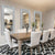 Miroir mural rectangulaire design avec cadre en cristaux installé dans une salle à manger élégante.