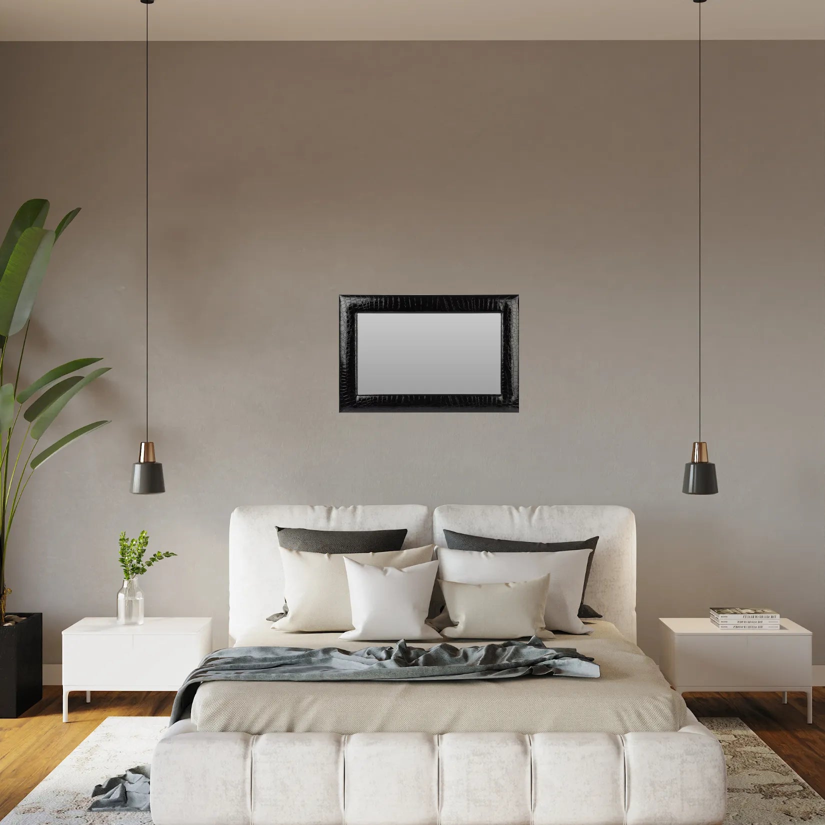 Miroir noir rectangulaire dans une chambre parentale au mur gris.