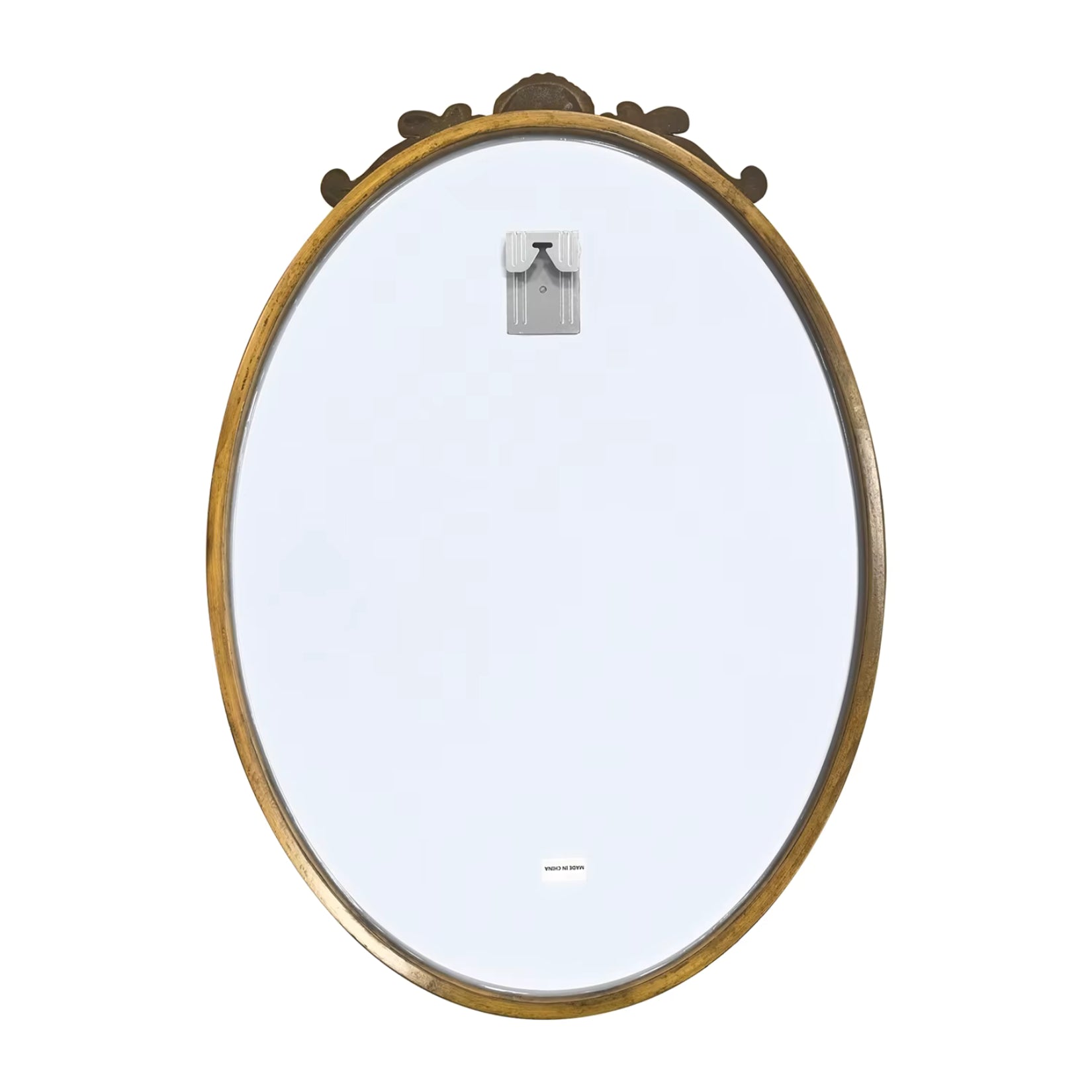 Vue arrière du miroir ovale doré avec système de fixation murale intégré pour une installation facile.