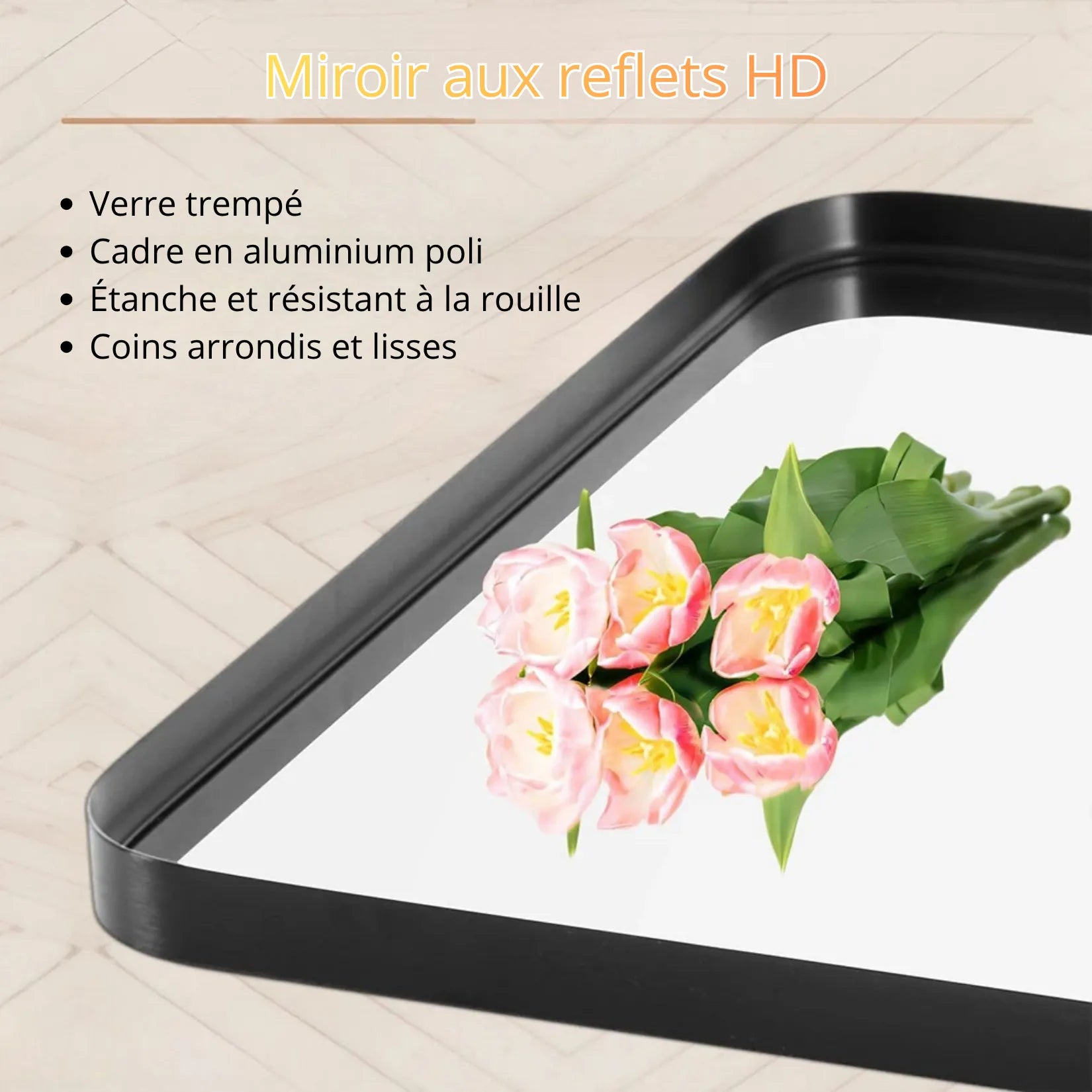 Détail cadre aluminium poli noir mat et coins arrondis du miroir rectangulaire.