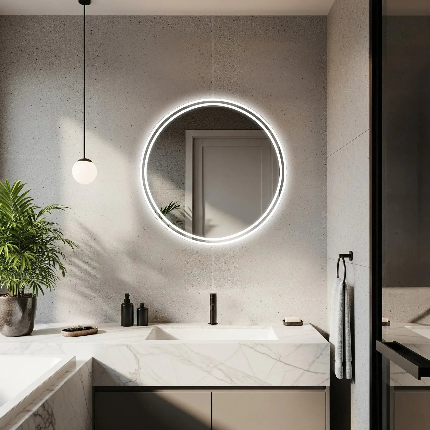 Miroir rond 100 cm double anneau lumineux sur mur béton et plan marbre.