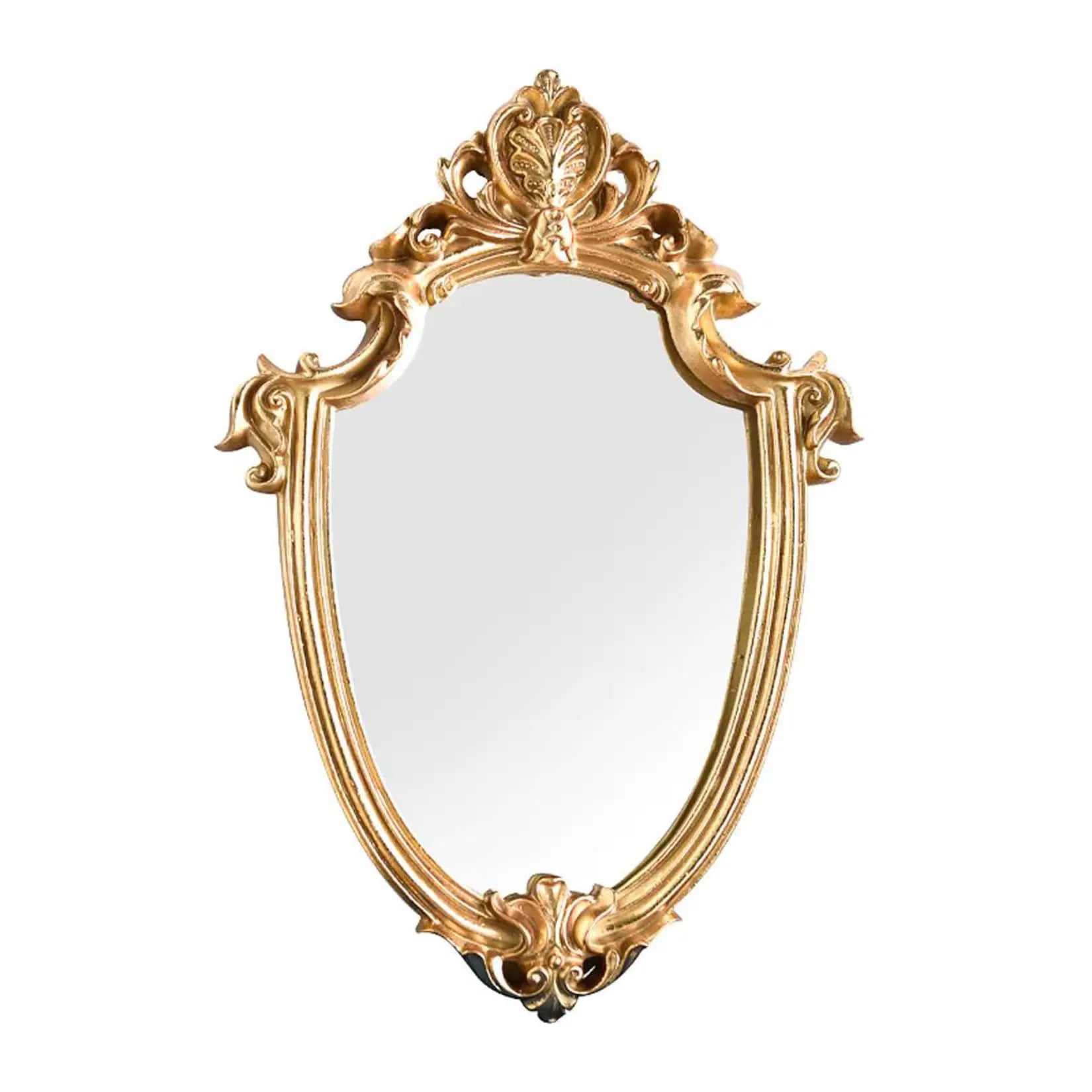 Miroir rond doré baroque sur fond blanc simple.