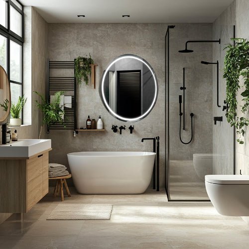 Miroir rond LED 70 cm installé dans une salle de bain moderne avec éclairage LED ajustable pour une ambiance élégante et fonctionnelle