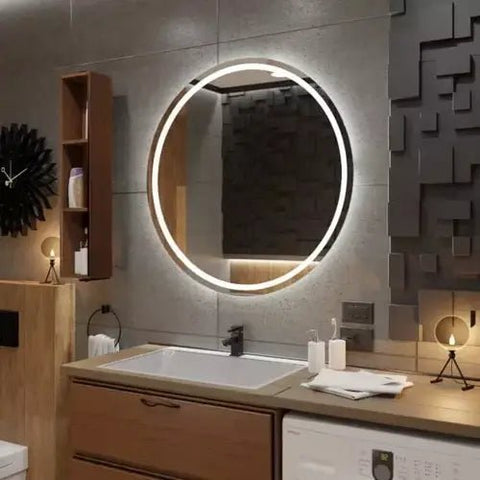 Miroir rond LED 100 cm Bluetooth sur un mur gris contrastant.