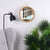 Miroir mural en rotin 30 cm installé dans une chambre au style bohème chic.