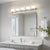 Miroir simple salle de bain 45x60 cm avec éclairage mural, idéal pour optimiser la luminosité.