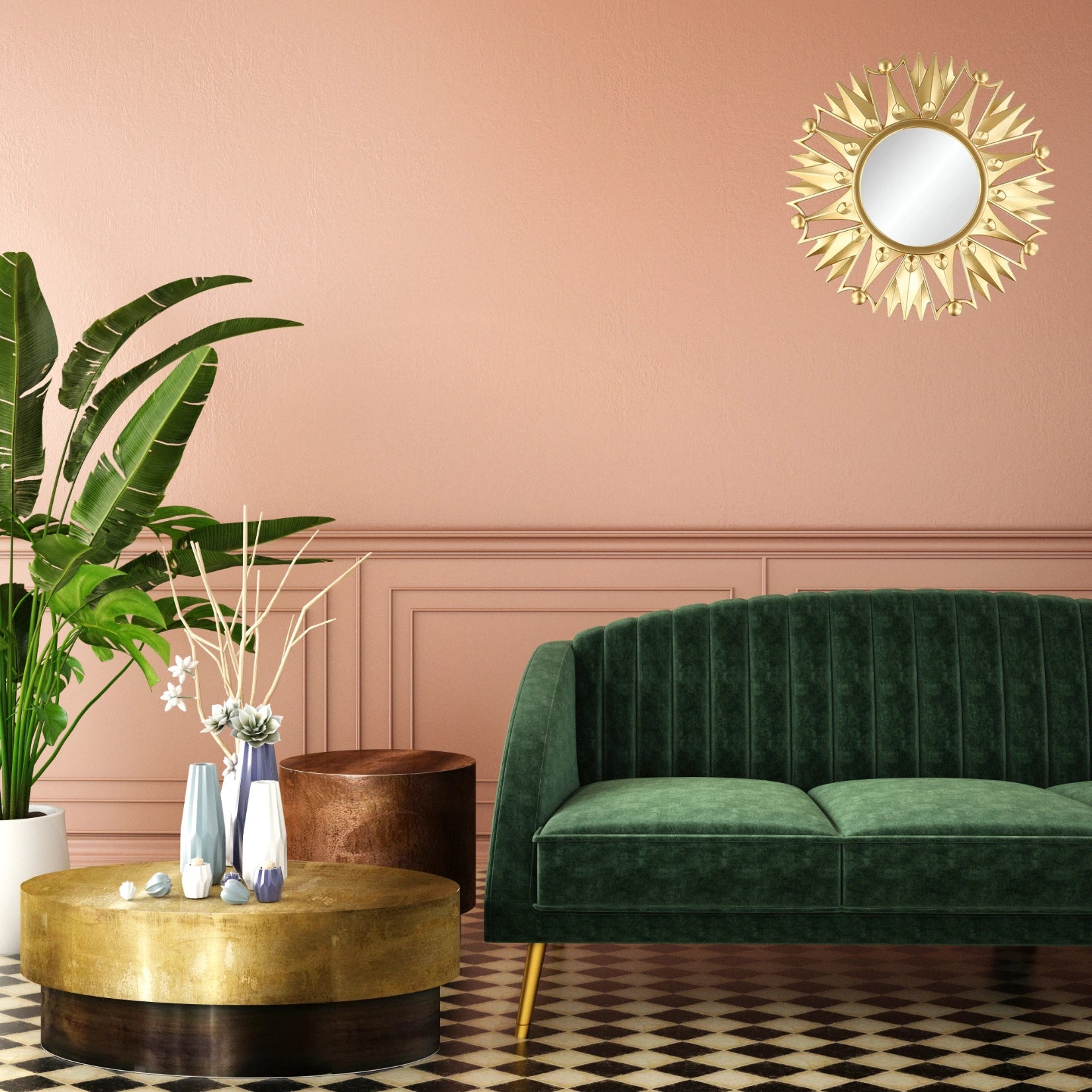 Petit miroir doré rond accroché sur un mur rose poudré dans un salon chic et coloré.