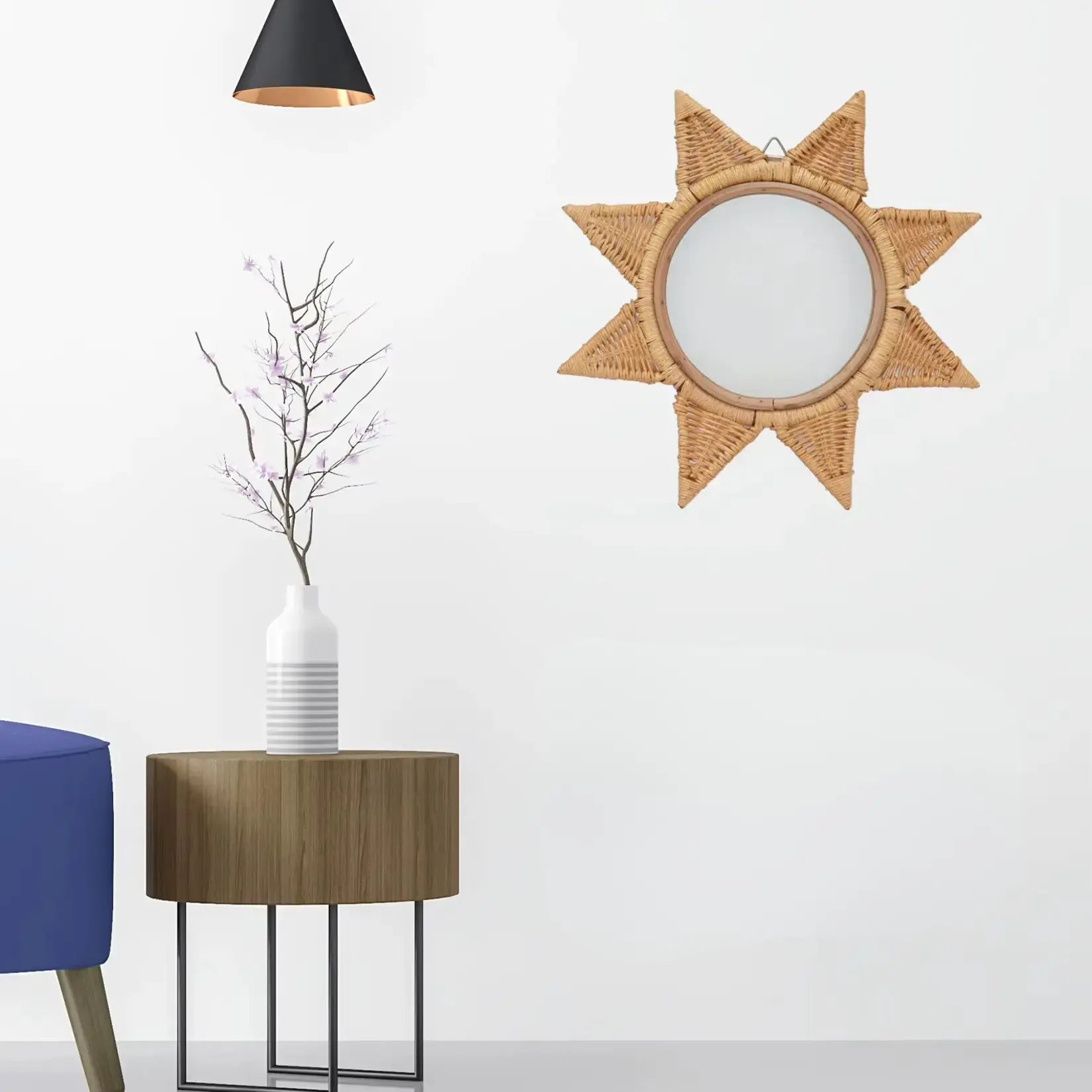 Petit Miroir en Rotin Pas Cher accroché au mur blanc pour un effet déco naturel.